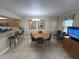 Bright dining area with table and chairs, kitchen view at 3187 Sea World Ct, Kissimmee, FL 34746