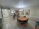 Bright dining area with table and chairs, kitchen view at 3187 Sea World Ct, Kissimmee, FL 34746