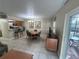 Dining room features a round table and chairs with access to patio at 3187 Sea World Ct, Kissimmee, FL 34746