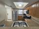 Modern kitchen with stainless steel appliances and granite countertops at 3187 Sea World Ct, Kissimmee, FL 34746