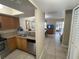 Kitchen with stainless steel appliances and wood cabinets at 3187 Sea World Ct, Kissimmee, FL 34746