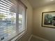 Upper hall with window and artwork at 3187 Sea World Ct, Kissimmee, FL 34746