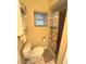 Bathroom featuring a toilet, enclosed shower with curtain, and a medicine cabinet for storage at 3197 Sea World Ct, Kissimmee, FL 34746