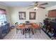 Quaint dining area featuring a wooden table and four chairs at 3197 Sea World Ct, Kissimmee, FL 34746