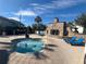 Relax in this community hot tub with surrounding lounge chairs at 3197 Sea World Ct, Kissimmee, FL 34746