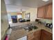 Kitchen features granite countertops and modern appliances at 3197 Sea World Ct, Kissimmee, FL 34746