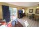 Inviting living area with access to a private patio and an adjacent dining space at 3197 Sea World Ct, Kissimmee, FL 34746