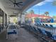 Poolside patio with foosball table, covered lounge chairs, and a clear view of the swimming pool at 3197 Sea World Ct, Kissimmee, FL 34746