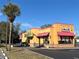 Exterior view of a Popeyes Louisiana Kitchen restaurant at 3197 Sea World Ct, Kissimmee, FL 34746