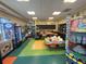 Bright recreation room complete with colorful decor, tables, crafting supplies, and snack vending machines at 3197 Sea World Ct, Kissimmee, FL 34746