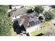 House with solar panels on the roof and a fenced backyard at 3260 Sorrel Ct, Deltona, FL 32725
