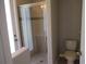 Small bathroom with shower and toilet at 3260 Sorrel Ct, Deltona, FL 32725