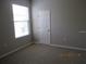 Bright bedroom with neutral walls and carpet flooring at 3260 Sorrel Ct, Deltona, FL 32725