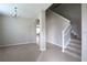 Bright and airy entryway with tiled floors, carpeting, and a staircase at 3260 Sorrel Ct, Deltona, FL 32725