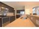 Modern kitchen featuring granite countertops and stainless steel appliances at 3260 Sorrel Ct, Deltona, FL 32725
