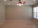 Spacious living room featuring tile flooring and a ceiling fan at 3260 Sorrel Ct, Deltona, FL 32725