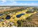 Wide aerial view of golf course community at 4 Arika At Lionspaw, Daytona Beach, FL 32124
