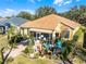 Aerial view showcasing house and beautifully landscaped yard at 4 Arika At Lionspaw, Daytona Beach, FL 32124