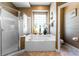 Spa-like bathroom featuring a large soaking tub and walk-in shower at 4 Arika At Lionspaw, Daytona Beach, FL 32124