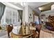 Charming breakfast nook with window seat and wood table at 4 Arika At Lionspaw, Daytona Beach, FL 32124