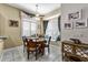Bright breakfast nook boasts a built-in window seat at 4 Arika At Lionspaw, Daytona Beach, FL 32124