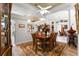 Elegant dining room features a wood table and chandelier at 4 Arika At Lionspaw, Daytona Beach, FL 32124
