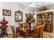 Spacious dining room with wood table and decorative accents at 4 Arika At Lionspaw, Daytona Beach, FL 32124