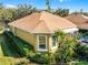 House exterior showcasing well-maintained landscaping at 4 Arika At Lionspaw, Daytona Beach, FL 32124