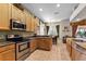 Spacious kitchen with granite countertops and stainless steel appliances at 4 Arika At Lionspaw, Daytona Beach, FL 32124