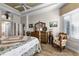 Spacious main bedroom with a king-size bed and dresser at 4 Arika At Lionspaw, Daytona Beach, FL 32124