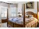 Main bedroom features a large bed and plenty of natural light at 4 Arika At Lionspaw, Daytona Beach, FL 32124