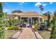 Outdoor patio with seating area and beautiful landscaping at 4 Arika At Lionspaw, Daytona Beach, FL 32124