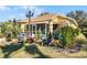 Landscaped yard with decorative plants and lighting at 4 Arika At Lionspaw, Daytona Beach, FL 32124