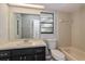 Bathroom features a tub and lots of light at 4001 Misty Morning Pl, Casselberry, FL 32707