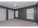 Bedroom with carpet flooring, a ceiling fan, and ample natural light at 4001 Misty Morning Pl, Casselberry, FL 32707