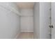 Walk-in closet with ample shelving, carpeted floor, and neutral paint, providing great storage options at 4001 Misty Morning Pl, Casselberry, FL 32707