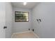 Laundry room features tile flooring at 4001 Misty Morning Pl, Casselberry, FL 32707