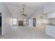 Bright living room with vaulted ceilings, a ceiling fan, and a stone fireplace at 4001 Misty Morning Pl, Casselberry, FL 32707
