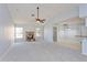Open living room with fireplace and vaulted ceilings at 4001 Misty Morning Pl, Casselberry, FL 32707