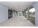 Covered patio with sliding glass doors offers space for outdoor entertaining and relaxing at 4001 Misty Morning Pl, Casselberry, FL 32707