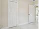 Bedroom with double door closet and marble floors at 4333 Arch St, Orlando, FL 32808