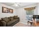 Bedroom with a couch, ceiling fan, and ample closet space at 600 Cranes Way # 206, Altamonte Springs, FL 32701