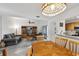 Open concept dining room with view of living room and kitchen at 600 Cranes Way # 206, Altamonte Springs, FL 32701