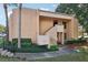 Exterior view of condo with stairs and landscaping at 600 Cranes Way # 206, Altamonte Springs, FL 32701