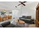 Bright living room with dining area and access to balcony at 600 Cranes Way # 206, Altamonte Springs, FL 32701