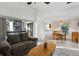 Open concept living room, dining area, and kitchen at 600 Cranes Way # 206, Altamonte Springs, FL 32701