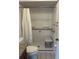 Walk-in shower with grab bars and seat, designed for accessibility and safety at 607 Waverly Ln # 403, Maitland, FL 32751