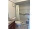 Bathroom featuring vanity with granite countertop and a walk-in shower with seat at 607 Waverly Ln # 403, Maitland, FL 32751