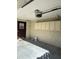 Garage with storage cabinets and ceiling mounted door control at 607 Waverly Ln # 403, Maitland, FL 32751