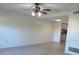 A ceiling fan and tile floors provide a comfortable setting in the open living space at 607 Waverly Ln # 403, Maitland, FL 32751